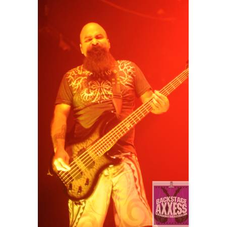 Tony Campos performing on the stage