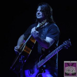 Stained Seneca Niagara casino singer with guitar