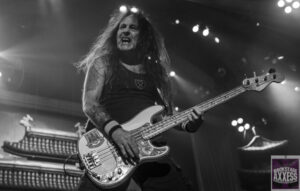 Steve Harris performing on the stage