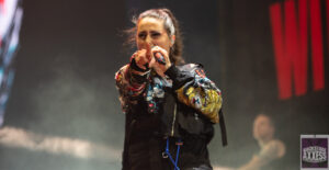 A female music pop star performing black and white picture