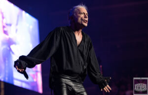 A singer singing amazingly on the Backstage Axxess events